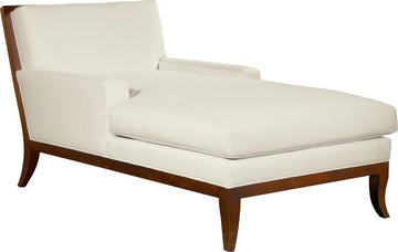 White Curtis Chaise with splayed legs and exposed wood frame.