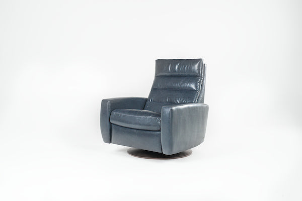 A blue Lanier leather recliner chair with the shape of classic automotive designs.