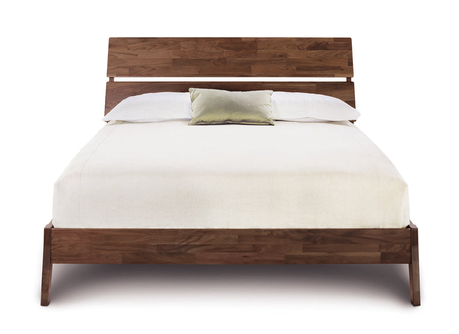 Linn queen size bed crafted from reclaimed walnut hardwood with contemporary design, front view.