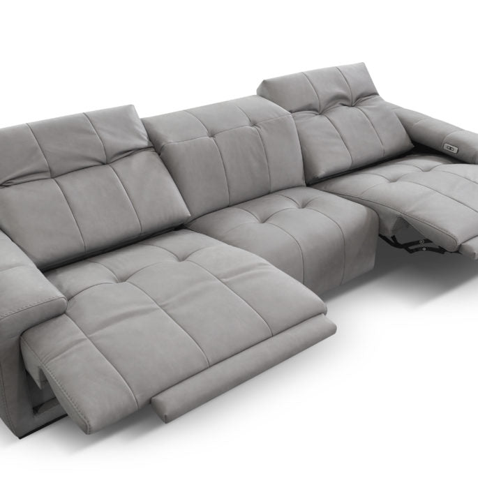 Grey leather 3 seater sofa consisting of 1 left arm, 1 right arm, and 1 armless chair with electric head and footrest. Reclined left and right seat.