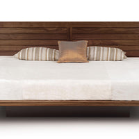 King size Moduluxe bed with modular headboard and nightstands with a floating look in wood colors.