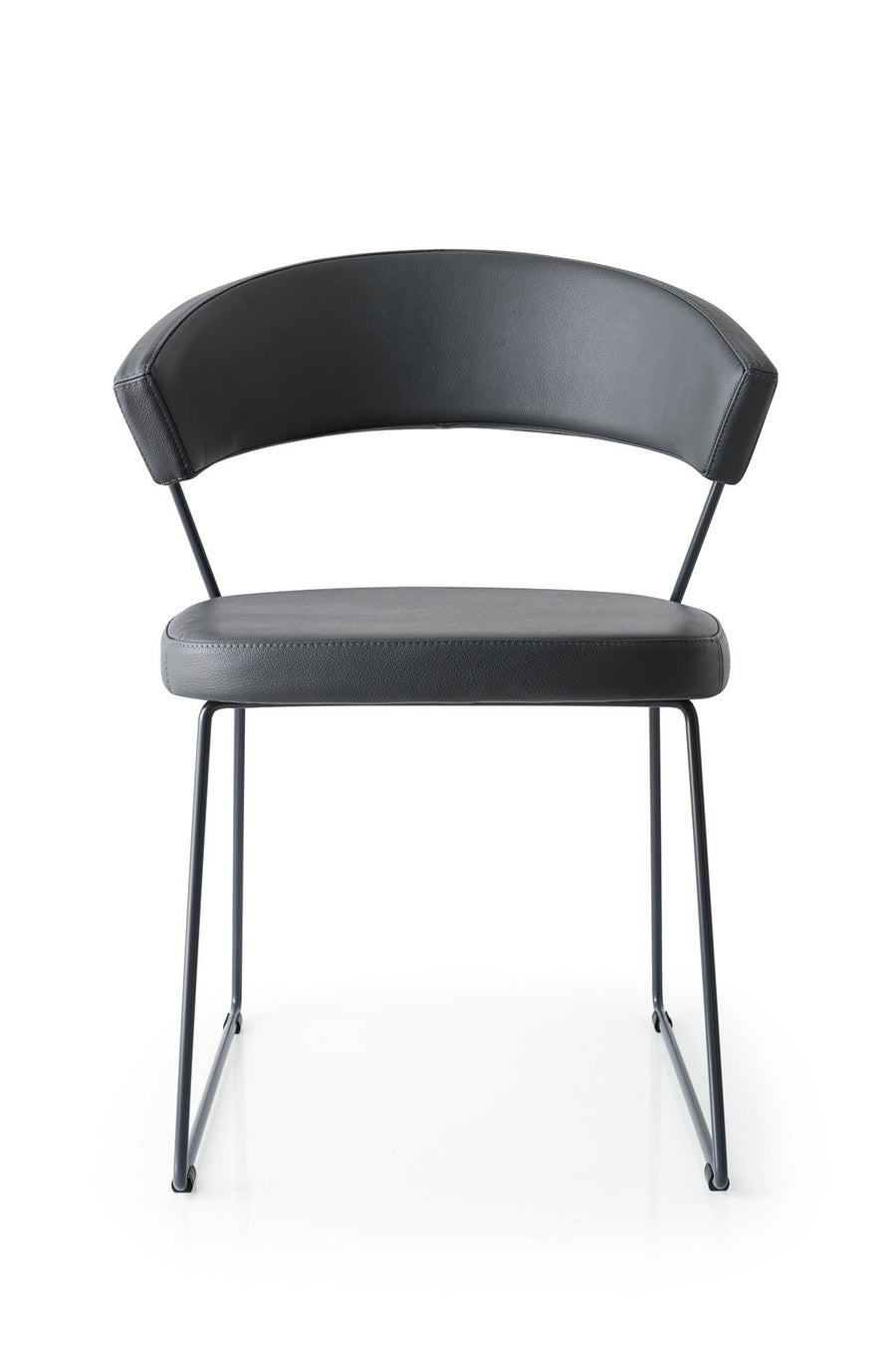 A black leather New York Dining Chair with metal frame and sled base and curved back. Front view.