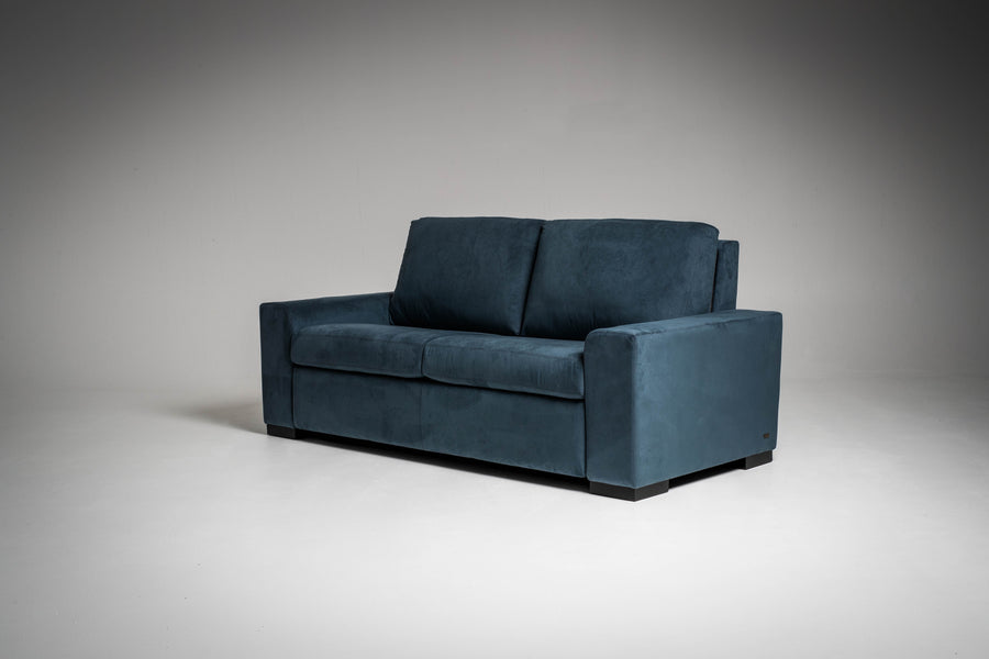 American Leather Olson Two Seat Standard (Queen) Comfort Sofa bed in indigo color, side and front view.