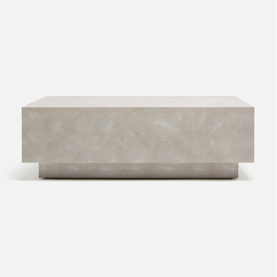 Blocky, closed-sided white Ordan Cocktail table entirely covered in luxurious faux shagreen circular cutouts.
