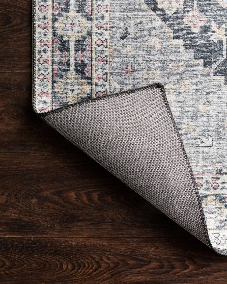 Skye Charcoal/Multi Area Rug power-loomed of 100% polyester and with printed designs provide the textured effect of high-end rugs.