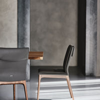 Black Sofia Dining side chair with wooden base. 