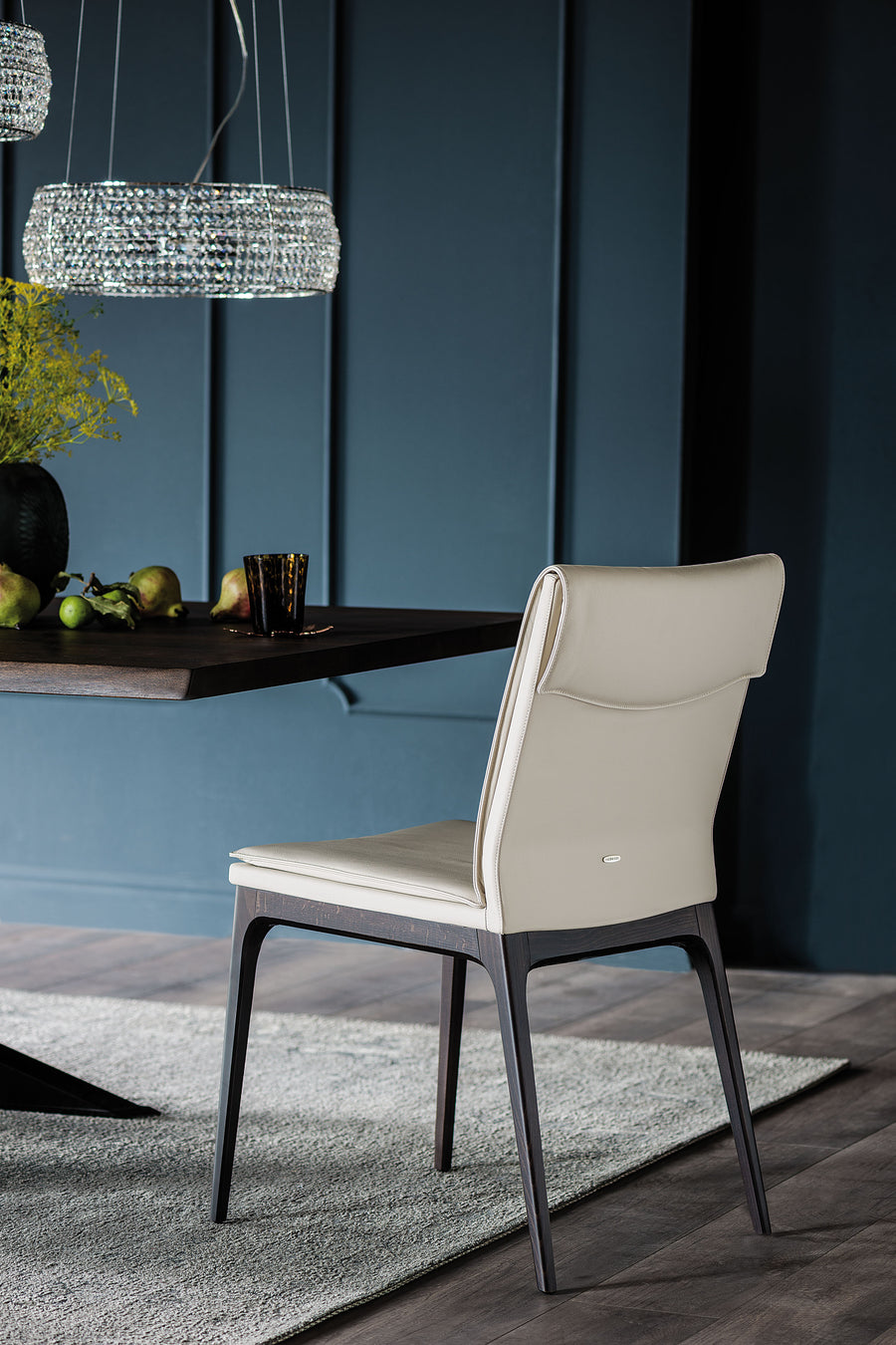 White Sofia Dining side chair with wooden base. 