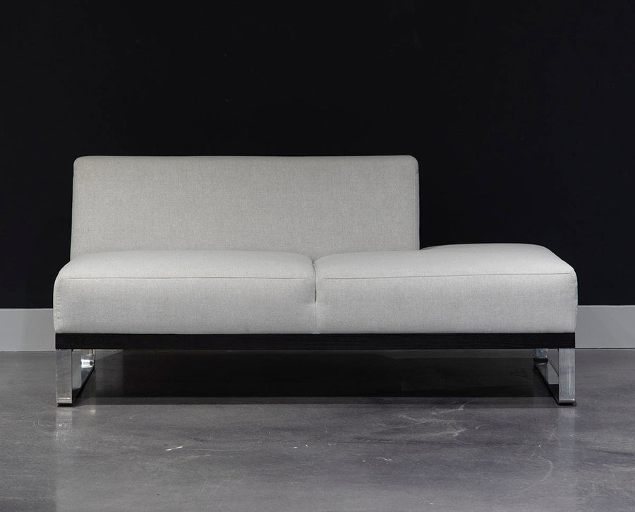 Ash two seat Sodeo Sofa with sophisticated architectural design and slab and classic and contemporary metal platform. Front view.