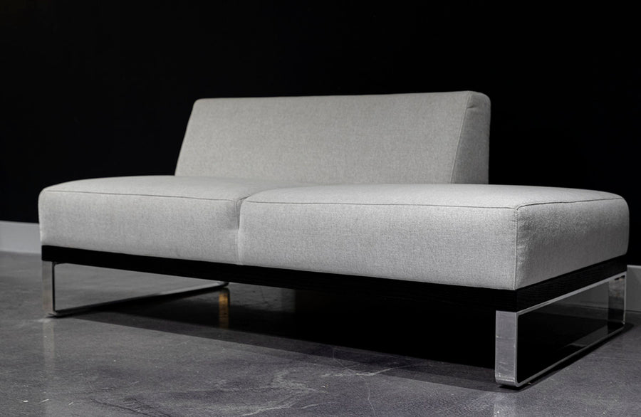 Ash two seat Sodeo Sofa with sophisticated architectural design and slab and classic and contemporary metal platform. Front view.