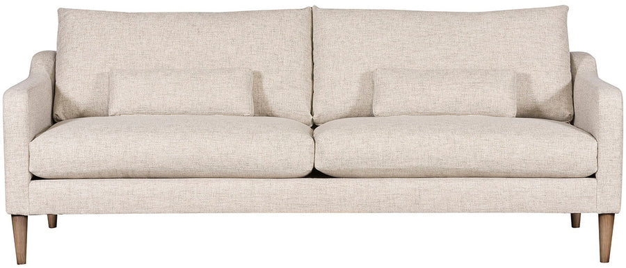Thea Stocked two seat sofa with medium firm seat and back done in a feather blend cushion with lower arm that is shaped from back to front. Front view.