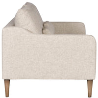 Thea Stocked two seat sofa with medium firm seat and back done in a feather blend cushion with lower arm that is shaped from back to front. Side view.