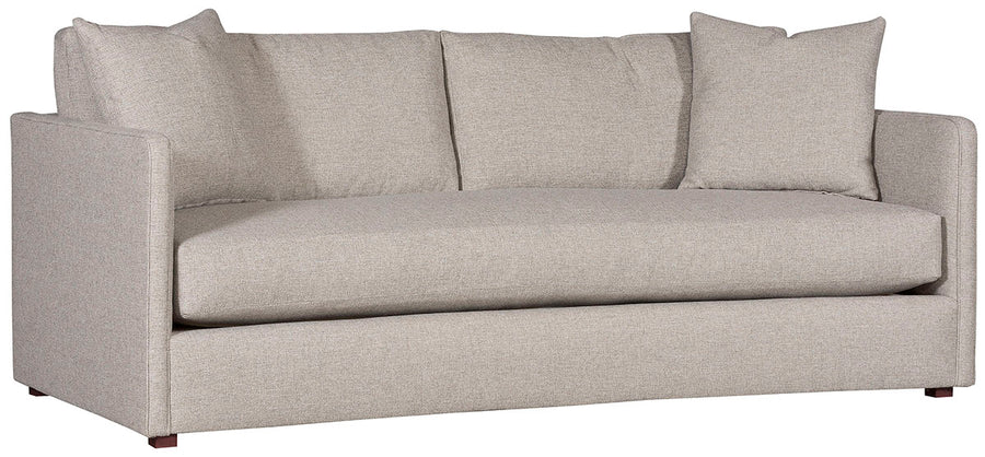 Light grey two seat Wynne Stocked Sofa with curved back and front and single seat cushion and 2 back pillows. Front view.