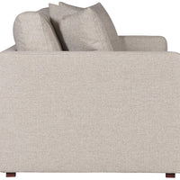 Light grey two seat Wynne Stocked Sofa with curved back and front and single seat cushion and 2 back pillows. Side view.