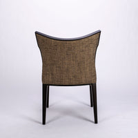 Villa side dining chair with solid beech wood frame that twists and curves to form the lines of the chair, back view.