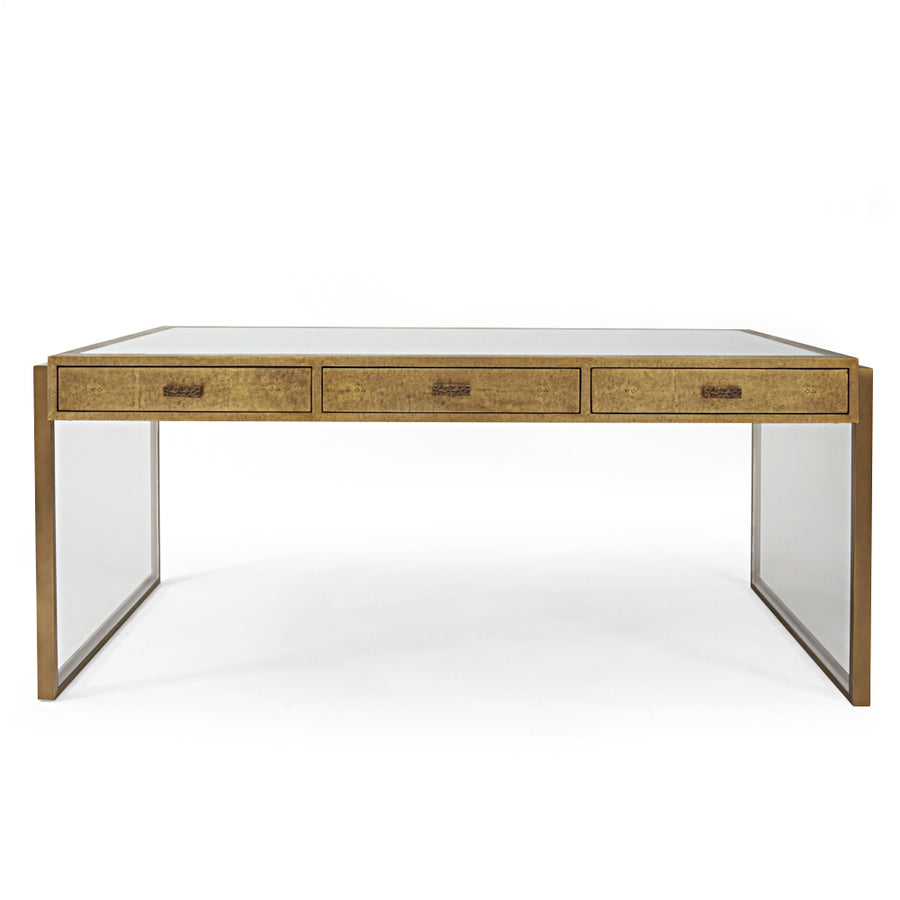 Brooklyn Desk finished in shagreen metal, supported by brass wrapped rectangular legs, and with three drawers. Front view.
