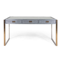 Brooklyn Desk finished in shagreen metal, supported by brass wrapped rectangular legs, and with three drawers.
