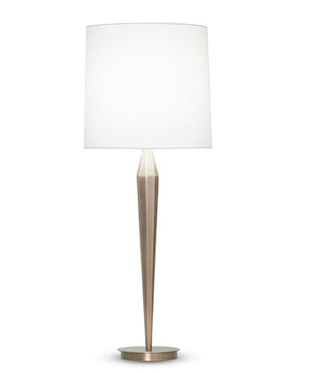 Tall metal Chloe Table Lamp with an off-white linen drum shade and round base in  an antique brass finish.