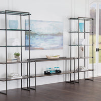 Multiple Spa Etagere shelfs joined and placed in a room with various decorative items on the shelfs.