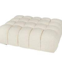 Wooly white Cole ottoman with the channel tufted egg crate top.