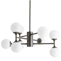 Dudley Chandelier with asymmetrical design, steel foundation with a distinct bronze finish, and nine large opal glass globes extend from the linear tiered arms.