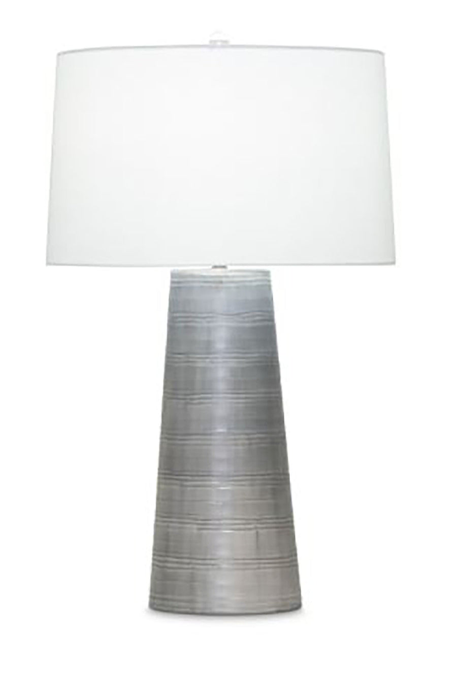 Charles Table Lamp with a white shade and hand made tapered glass column that has a soft, grey carved finish.