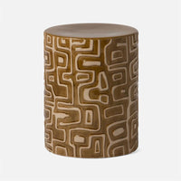 Loman Side Table made from natural clay in cylindrical shape with raised patterns.