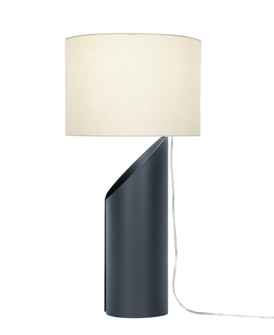 Jade Table Lamp with a white drum shade and organic silhouette body that combines with a deep Black Matte finish. Side view.