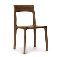 Lisse dining chair crafted in solid American black walnut hardwood and Made to Order in natural finish. Front and side view.