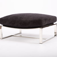 Dark grey ottoman with a brushed bronze frame combined with the luxurious seat.