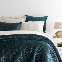 King quilt and standard sham from Matte Velvet Juniper bedding Collection in blue and white colors.