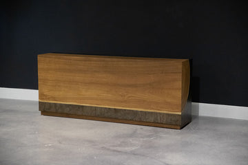 Yuka wood Kobe console with the anodized metal panels and toasted finish.