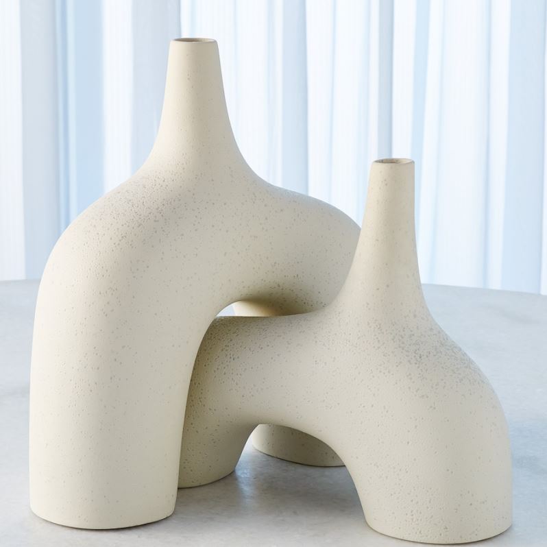 Two White Stretch Vases Reminiscent of the 1960's lava glaze ceramics.