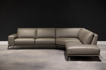 Brown leather Tivoli sectional with classic contemporary lines, glove soft top grain leather and high end memory foam seating comfort with frame that floats on bronze legs.