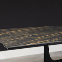 Fixed rectangular Universe Dining Table with lacquered metal frame and decorative details and with anti-scratch SuperMarble top. Closed up view on the top surface.