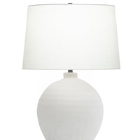  Trudelle Table Lamp with a dramatic ceramic base with an off-white linen drum shade. 