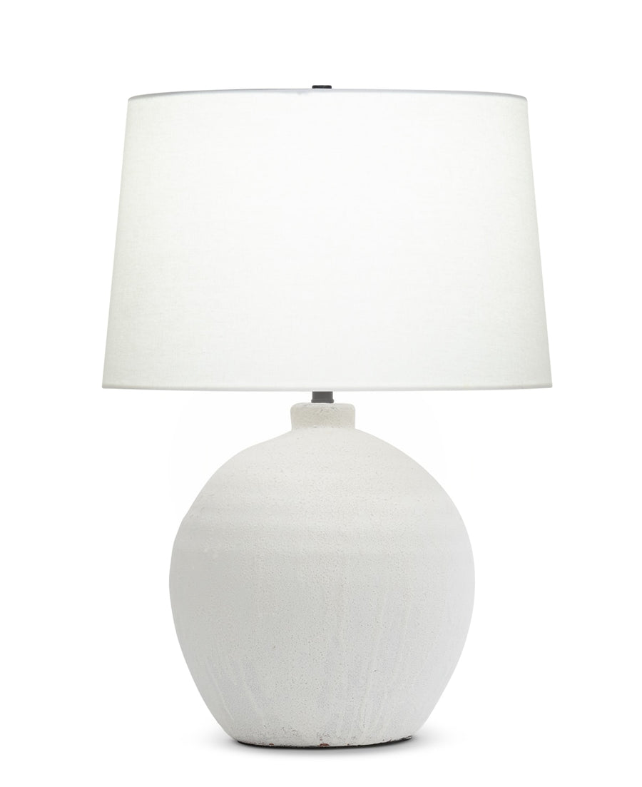  Trudelle Table Lamp with a dramatic ceramic base with an off-white linen drum shade. 