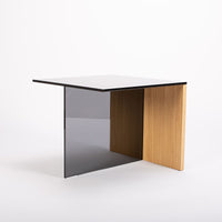 Square-topped Regolo Coffee Table with smoked glass element and wood base.