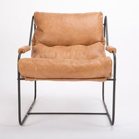 Brando contemporary lounge chair with industrial metal frame with a reclined back and plush feather down fill. Front view.