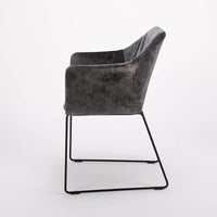 Black New York Arm Chair with painted finish and fully removable covers. Side view.