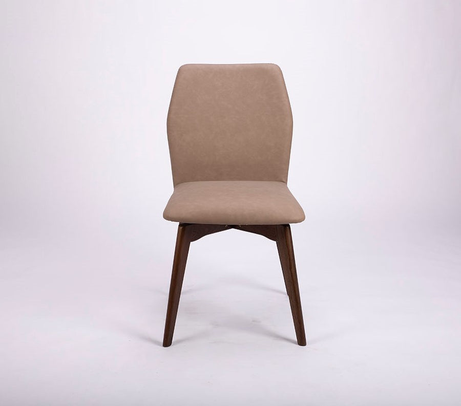 A beige Hexa swivel dining chair with wood base. Front view.