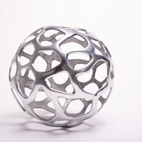 Ennis Web Whimsical Sphere made from antique silver.