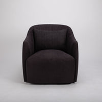 Dark brown fabric Viki swivel lounge chair with tapered arms and tight seat design.