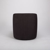 Dark brown fabric Viki swivel lounge chair with tapered arms and tight seat design, back view.