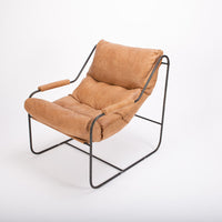 Brando contemporary lounge chair with industrial metal frame with a reclined back and plush feather down fill. Front and side view.