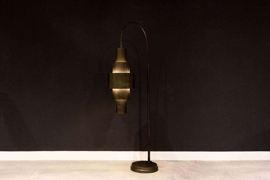Black Babylon Floor Lamp with formed of bold concentric circles and with floor switch on cord. 