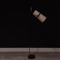 Yasmin Antique Iron modern Floor Lamp with a black iron tapered slender vertical rod and a blade shaped vintage brass finish finial.