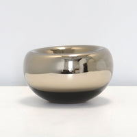 Echo vessel with rounded asymmetrical shapes of handblown Czech glass in transparent colors with dimpled voids at their tops.