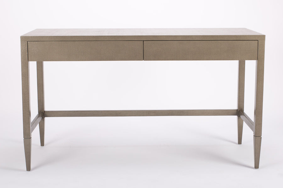 Conrad Desk with clean and simple design, finished in “seal” colored faux raffia, and with two flush drawers.